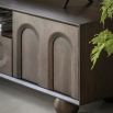 Dark wood media unit with arch patterns and round ball feet