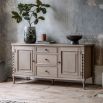 Lime wash wooden sideboard with bobble effect legs