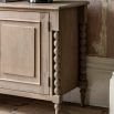 Lime wash wooden sideboard with bobble effect legs