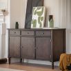 Traditional style sideboard with three drawers and three cupboards in dark brown