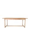 Wooden dining table with shaped underframe