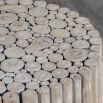 Side table crafted from natural teak wood pieces