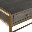 Elegant minimal desk with antiqued brass legs and two drawers with hollow shelf