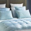 A luxurious pastel blue linen quilt