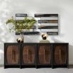 Dark wood sideboard with four panelled doors and brass handles