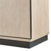 Light wood sideboard with four doors and black accents