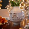 A glamorous glossy porcelain vase by Jonathan Adler with gorgeous gold symbols