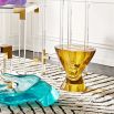 A sculptural hand-crafted brass pedestal table by Jonathan Adler 