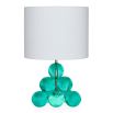 Blue globe side lamp with white linen shade