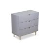Grey chest of drawers with hexagon pattern and brass legs