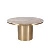 Round dining table with beautiful brushed brass finish and clean white marble