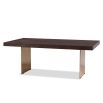 Dining table with rectangular brass legs and stylish top of figured dark brown ash veneer