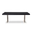 Dining table with rectangular brass legs and stylish top of figured black ash veneer