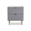 Grey bedside with hexagonal inlay pattern and brass accents
