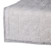 A luxurious, super-king grey paisley bedspread