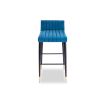 dazzling blue velvet bar stool with fluting details and brass capped feet