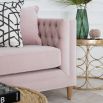 Luxurious deep buttoned pink velvet sofa