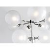 A chic and contemporary chandelier with symmetrical round glass shades and a polished nickel finish by Hudson Valley