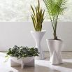 Elevate your space with the Hans Low Planter. Its modern design and durable material make it perfect for indoor and outdoor plants. Style meets functionality!