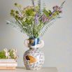 Elevate your space with the Hezha Vase, a stunning blend of modern design and elegance. Perfect for showcasing your favorite blooms or standing alone.