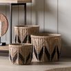 Set of three woven baskets with black detailing