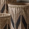 Set of three woven baskets with black detailing
