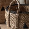 Set of three woven baskets with black detailing