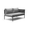 A luxury outdoor love seat from Willow's Outdoor collection with bespoke sunbrella upholstery