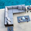 A luxury outdoor love seat from Willow's Outdoor collection with bespoke sunbrella upholstery