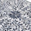 Curved console table in blue and white floral design