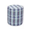 A luxury pouffe by Eva Sonaike with a blue African-inspired pattern