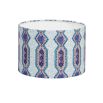 A luxury lampshade by Eva Sonaike with a blue African-inspired pattern