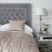 Luxury nickel studded bed with deep buttoning in luxury grey velvet