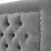 Luxury nickel studded bed with deep buttoning in luxury grey velvet