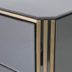 Tinted mirrored cabinet with brass frame and square handles