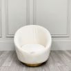 Clearance - A stunning white swivel/rocking chair with a golden base