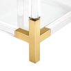 A stylish brass and acrylic accent table 