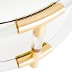 A chic cocktail table by Jonathan Adler with a round, brushed brass and clear acrylic structure 