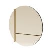 Round mirror with golden steel frame and detailing