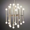 A chic chandelier with nickel bamboo stalks and globe bulbs