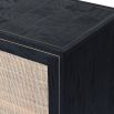 A stylish black oak and natural rattan sideboard with antique brass-effect details