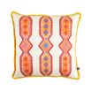 A luxury cushion by Eva Sonaike with an orange African-inspired pattern and fringing
