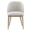 The Eton Dining Chair, with its curved upholstered back, soft linen fabric, and solid oak frame, offers modern comfort and Scandinavian-inspired style for everyday dining.