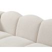 A beautiful sofa by Liang & Eimil with a luxury boucle upholstery and stylish shape