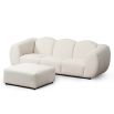 A beautiful sofa by Liang & Eimil with a luxury boucle upholstery and stylish shape