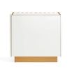 A retro-futuristic inspired cabinet in an ivory finish and brass base