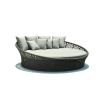 White upholstered round daybed with rope woven base