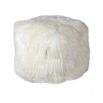 A luxury, Tibetan lamb fur pouffe with an off-white finish 