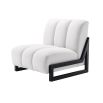 A luxurious and chic white Lando chair with black angular, wooden legs