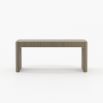 Striking three drawer desk in a grey wood finish with brass accents